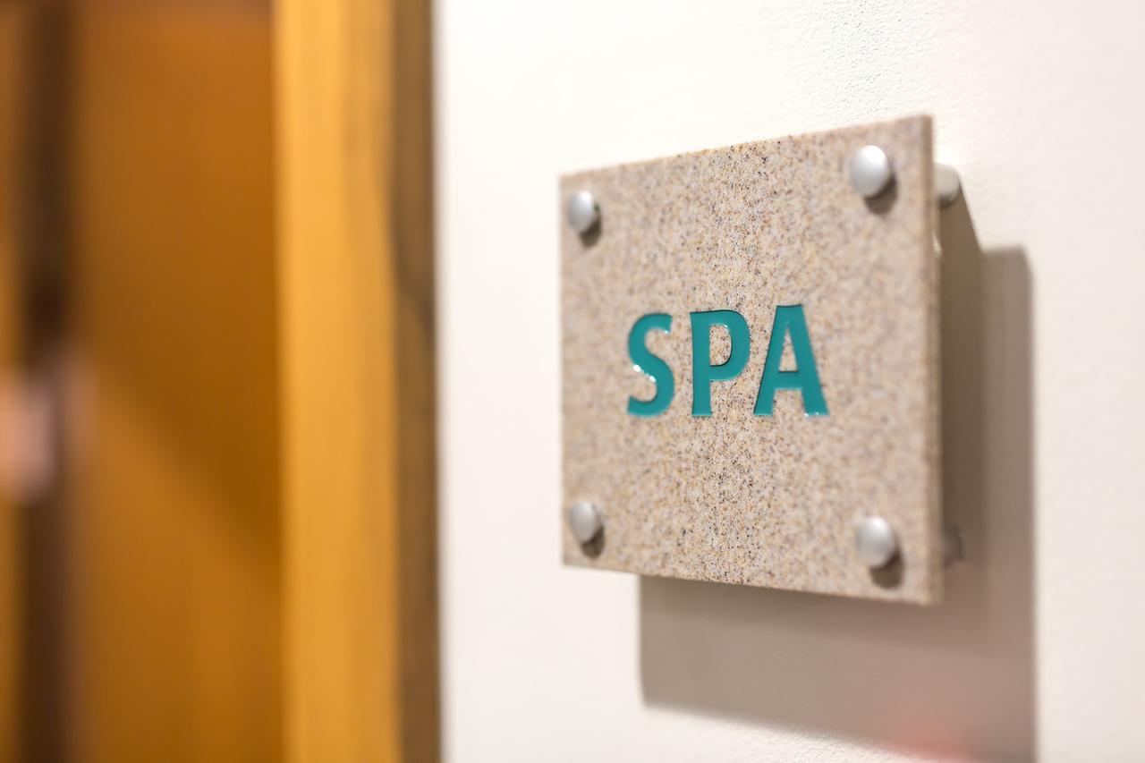 Merchants Crown Suites And Spa Prague Exterior photo Spa sign